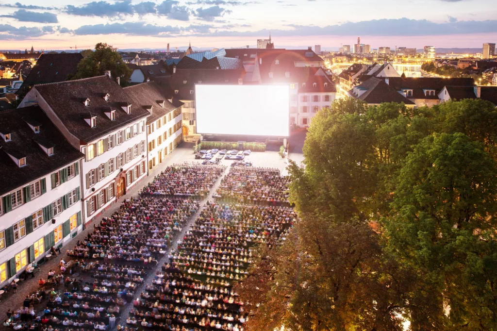 Allianz Cinema Basel Schweiz Luftaufnahme kurz vor Sonnenuntergang